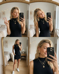 niffty black ribbed knit two-piece set with sleeveless mock-neck asymmetric top and mini skirt worn by a blonde model
