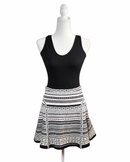 niffty Diane von Furstenberg A-line skirt featuring a black, white, and purple geometric stripe print on a mannequin.