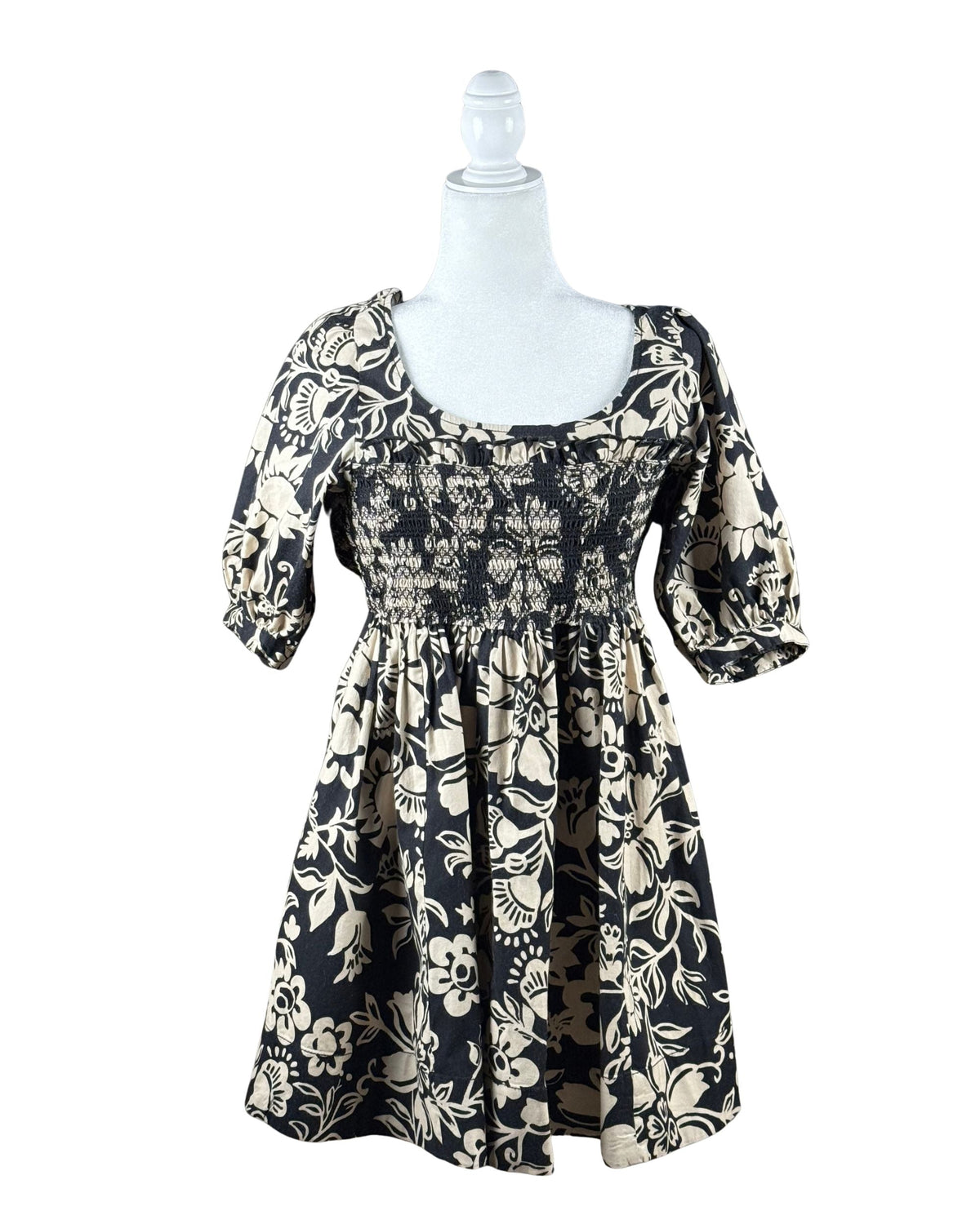 niffty Free People Dear Delilah mini dress in black and cream floral print with smocked bust and puff sleeves