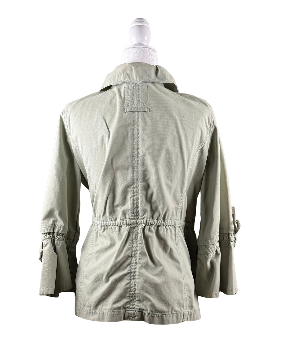 niffty Banana Republic x Olivia Palermo sage green cotton utility jacket, back view with drawstring waist