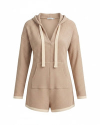 niffty taupe waffle knit hooded romper with long sleeves, contrasting drawstring, and pockets